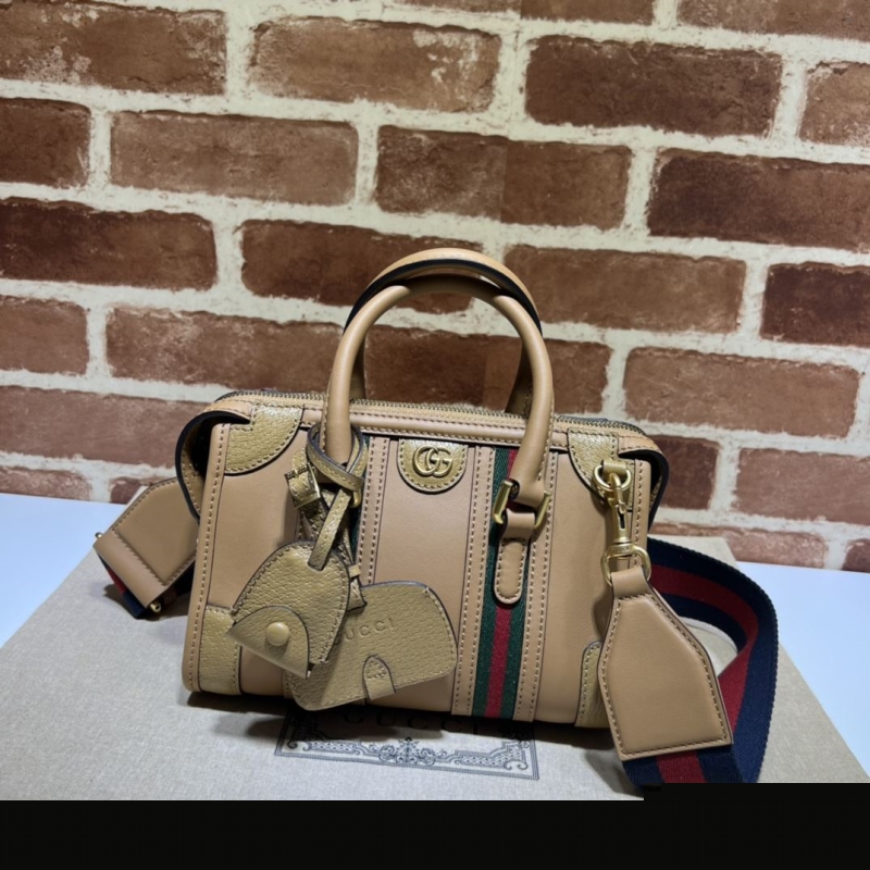 G*u*i top handle bags